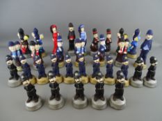 Large parcel of semi-glazed Laurel & Hardy and other comic figurines (chess set)