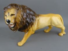 Beswick pottery stalking lion