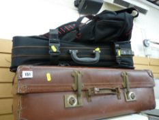 Vintage travel case and two modern