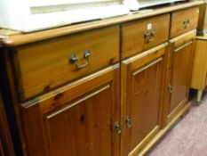 Modern pine three drawer over three doors sideboard