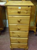 Pine narrow chest of six drawers