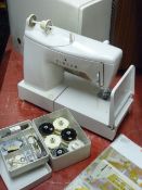Cased Singer electric sewing machine E/T