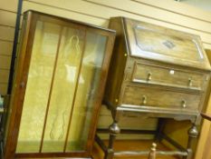 Two drawer writing bureau and a single door display cabinet