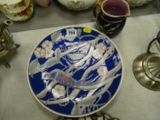 Majolica style jug and a peacock decorated Oriental plate