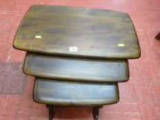 Ercol dark wood nest of three tables