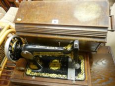 Wooden cased manual Singer sewing machine