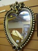 Gilt framed heart shaped mirror
