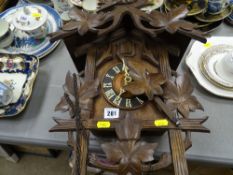 Cuckoo clock with weights