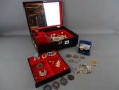 Black lacquered floral decorated musical jewellery box and contents