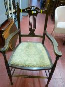 Polished wood elbow chair with upholstered seat having stud detail