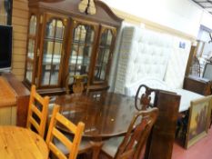 Modern dining suite of table, six (four plus two) dining chairs and display cupboard