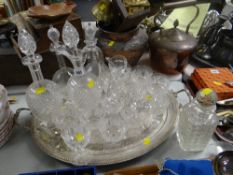 A quantity of crystal glassware including decanters on an EPNS twin-handled tray ETC Condition