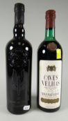 Two old bottles including a commemorative SAS Regiment Taylor's Port bottle Condition Report: please