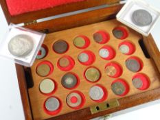 A coin box & contents including a believed silver British Trade Dollar dated 1911 & a William IV