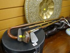 Three old golf clubs, a silver mounted walking stick, hat box & Islamic brass top table Condition