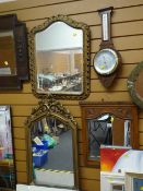 Two gilt framed mirrors, a wooden framed mirror & a barometer Condition Report: please request* *