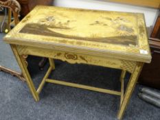 An antique chinoiserie decorated fold over card table with baize lined interior decorated with