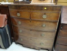 An antique bow front mahogany chest of three long & two short drawers together with a fold-over