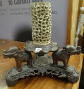 Carved Eastern design tri-form stand decorated with elephants & dragons below a lotus leaf having