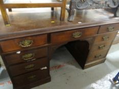 A vintage pedestal desk of nine drawers with brass handles Condition Report: please request* *