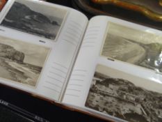 A modern postcard album with approx. 200 vintage black & white British seaside postcards Condition