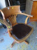 A good vintage leatherette & studded cushion captain's-style chair Condition Report: please request*
