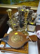 A parcel of metalware including pair of brass twist candlestick holders, set of goblets, pair of