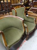 An antique inlaid mahogany elbow chair & a similarly upholstered inlaid mahogany tub chair Condition
