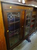 A vintage inlaid two-door china cabinet with stained glass & pretty decoration to rail(distressed)