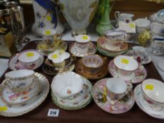 A collection of cabinet cups & saucers including Austrian examples, Coalport, pink lustre ETC