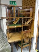 A good vintage oak extending square dining table together with 4+2 matching chairs with green