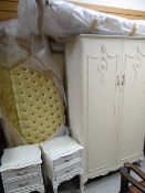 A vintage white painted French-style two-door wardrobe & similar pair of bedside tables together