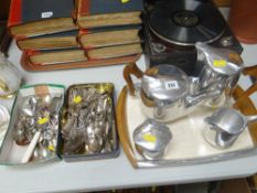 An iconic design five-piece Picquot ware chromed teaset together with a quantity of loose flatware