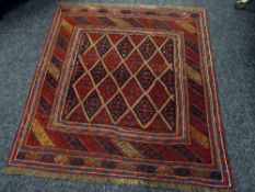 A Gazak patterned mainly blue & red rug Condition Report: please request* *Condition is not stated