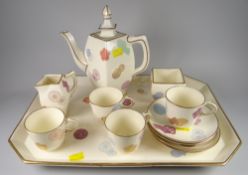 A rare British Victorian cream-ground pottery coffee-set comprising tray, coffee pot with lid, cream