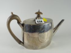 A George III silver oval teapot with engraved M within shield & of plain form, hallmarks for