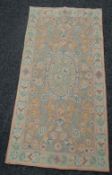 A Cashmira chain hand stitched rug, 117 x 59cms Condition Report: please request* *Condition is
