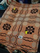 A pink ground geometric patterned Welsh blanket Condition Report: please request* *Condition is