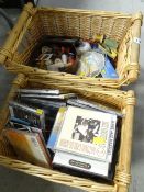 Two wicker baskets & contents including CDs, small quantity of sewing equipment Condition Report: