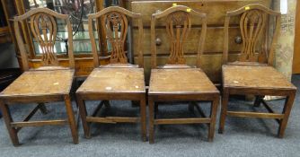 A set of four oak farmhouse chairs Condition Report: please request* *Condition is not stated in