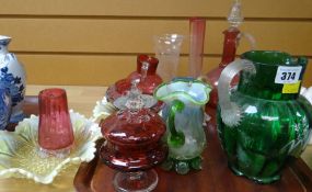 A quantity of mixed coloured antique glass including cranberry Condition Report: please request* *