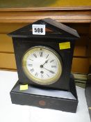 An antique slate mantel clock Condition Report: please request* *Condition is not stated in this
