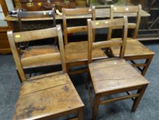 Set of four nineteenth century oak ladder back farmhouse kitchen chairs together with another