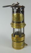 An early E Thomas & Williams Ltd, Aberdare cambrian midget miner's lamp Condition Report: please