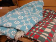 A turquoise ground geometric Welsh blanket & another Condition Report: please request* *Condition is