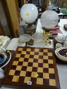 A modern painted soldier figure chess set together with two oil lamps ETC Condition Report: please
