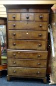 An antique oak & pine chest-on-chest on bracket feet with a base of three graduated drawers, the top