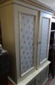 A white painted antique pine press cupboard with two-door base & two-door top Condition Report: