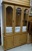 A pine dresser with three-section glazed top & three cupboards Condition Report: please request* *