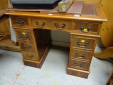 A good reproduction yew compact desk of nine drawers Condition Report: please request* *Condition is